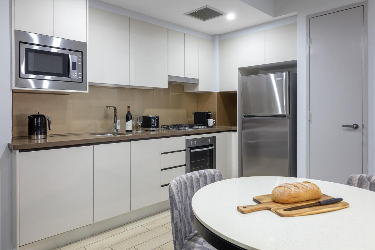 Meriton Suites North Ryde Sydney Eksteriør billede A typical kitchen in a residential apartment